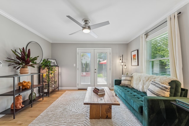 3985 Glenda Pl, Upper Arlington, OH 43220 - living room with plenty of natural light, crown molding, french doors, wood finished floors, and ceiling fan