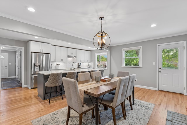 3985 Glenda Pl, Upper Arlington, OH 43220 - dining room featuring a chandelier, ornamental molding, light wood-type flooring, baseboards, and recessed lighting