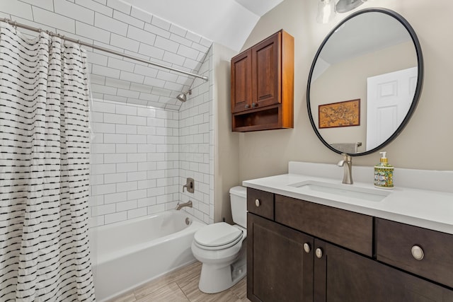 3985 Glenda Pl, Upper Arlington, OH 43220 - full bath with toilet, vanity, shower / tub combo with curtain, and lofted ceiling