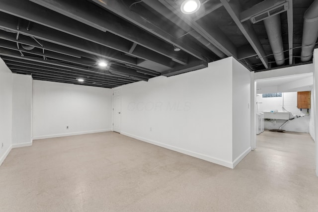 3985 Glenda Pl, Upper Arlington, OH 43220 - basement featuring baseboards and a sink
