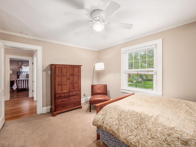 1635 Cambridge Blvd, Upper Arlington, OH 43212 - bedroom featuring crown molding, light carpet, baseboards, and a ceiling fan