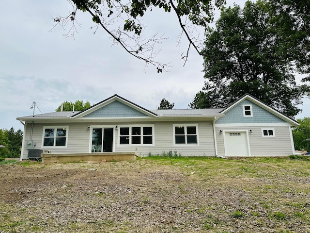 15848 Barnes Dr, Belle Center, OH 43310 - back of house featuring a garage