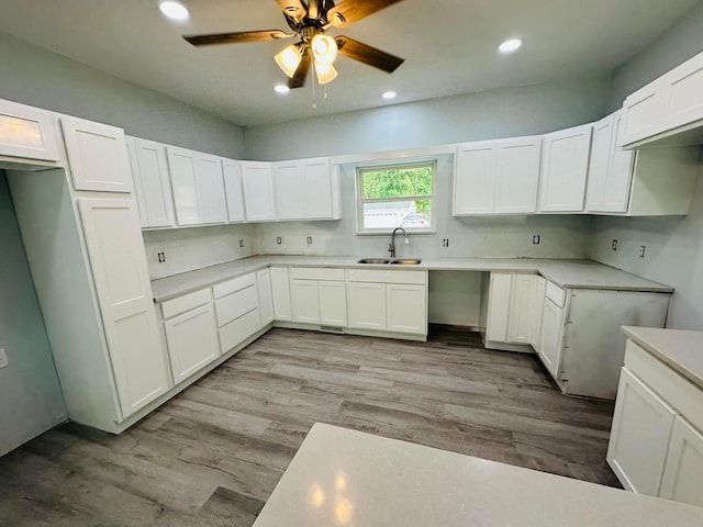 15848 Barnes Dr, Belle Center, OH 43310 - kitchen with a sink, light wood finished floors, a ceiling fan, recessed lighting, and white cabinets