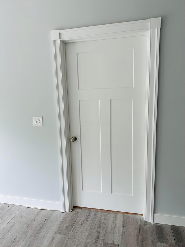 15848 Barnes Dr, Belle Center, OH 43310 - detailed view of wood finished floors and baseboards