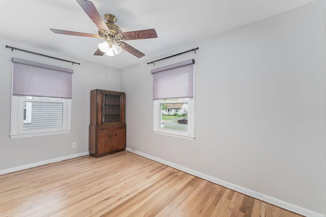 831 E Longview Ave, Columbus, OH 43224 - empty room featuring baseboards, wood finished floors, and a ceiling fan