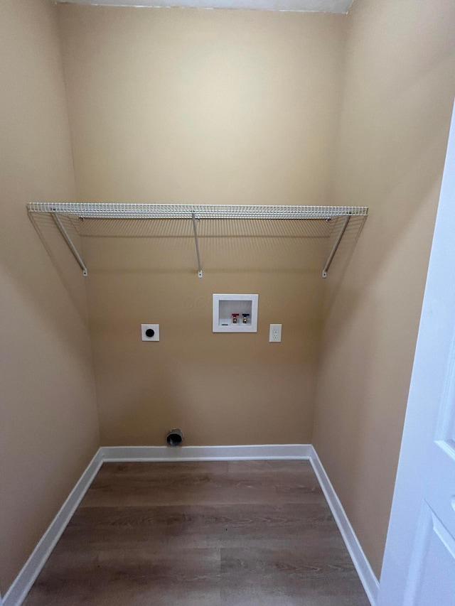 944 Binns Blvd, Columbus, OH 43204 - washroom with hookup for an electric dryer, baseboards, dark wood finished floors, and washer hookup