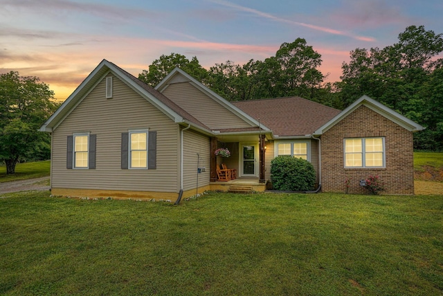 9805 Beaver Pike, Jackson, OH 45640 - view of front facade with a front yard and brick siding