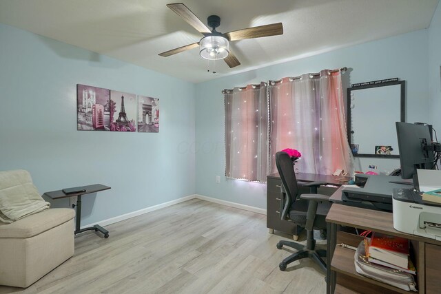 9805 Beaver Pike, Jackson, OH 45640 - home office with wood finished floors, ceiling fan, and baseboards