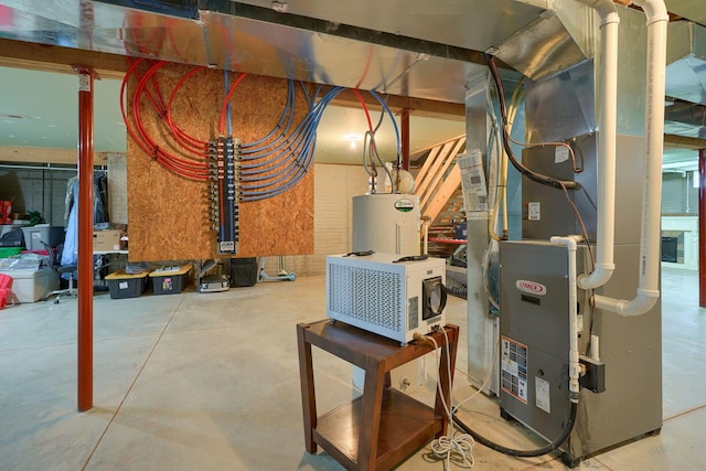 9805 Beaver Pike, Jackson, OH 45640 - utility room with water heater and heating unit