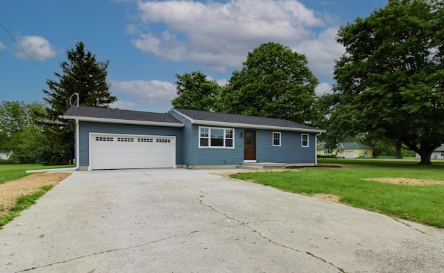 1541 Taft St, Marion, OH 43302 - single story home featuring an attached garage, driveway, and a front yard