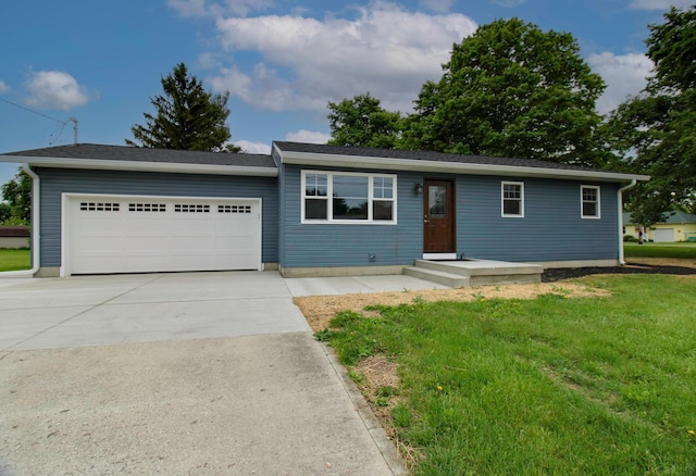 1541 Taft St, Marion, OH 43302 - single story home featuring an attached garage, driveway, and a front lawn