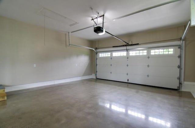 1541 Taft St, Marion, OH 43302 - garage with a garage door opener and baseboards