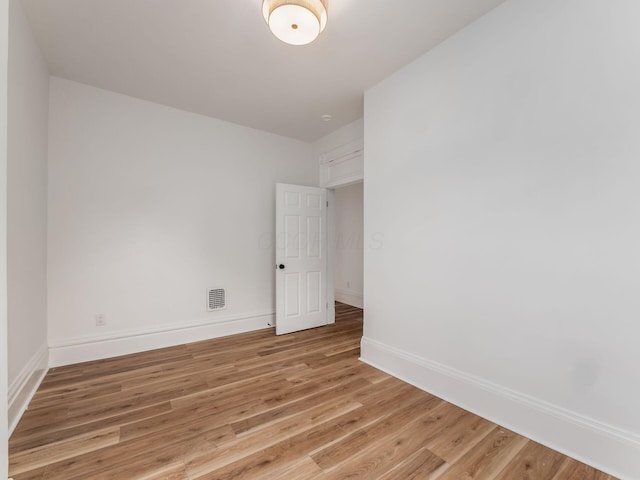 883 Wilson Ave, Columbus, OH 43206 - unfurnished room with light wood-style flooring and baseboards