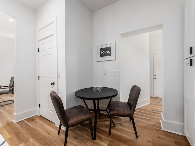 883 Wilson Ave, Columbus, OH 43206 - dining room featuring light wood finished floors and baseboards