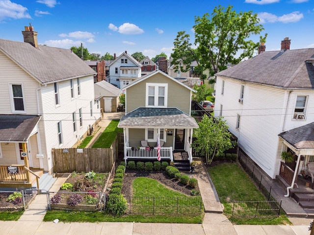 533 Stewart Ave, Columbus, OH 43206 - traditional style home featuring a residential view, a porch, a garden, and a gate