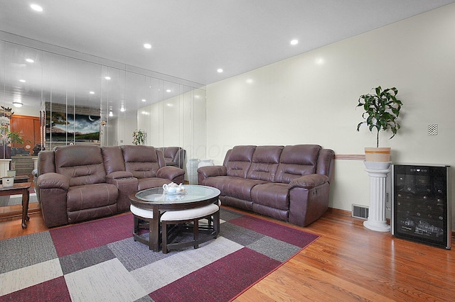1067 Bronwyn Ave, Columbus, OH 43204 - living room featuring wood finished floors and recessed lighting
