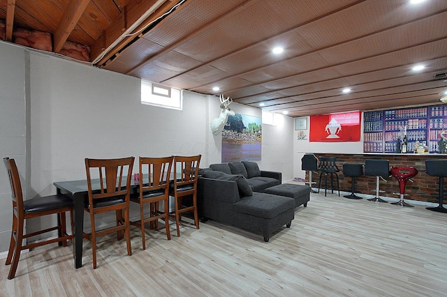 1067 Bronwyn Ave, Columbus, OH 43204 - dining space with a bar, wood finished floors, and recessed lighting