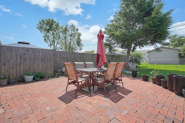 1067 Bronwyn Ave, Columbus, OH 43204 - view of patio / terrace featuring outdoor dining space