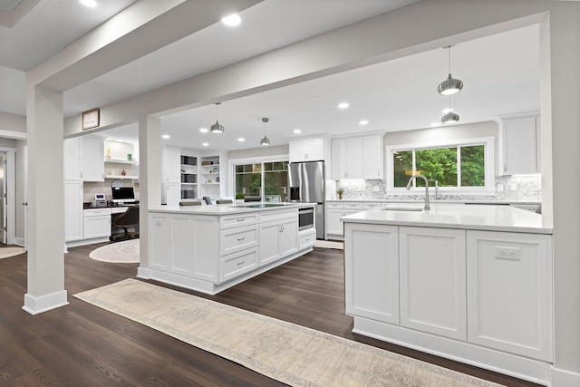 7276 Lee Rd, Westerville, OH 43081 - kitchen with a sink, stainless steel fridge with ice dispenser, dark wood-type flooring, tasteful backsplash, and white cabinets