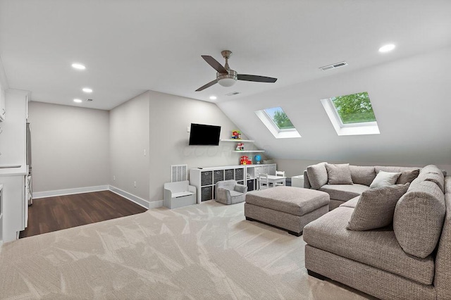 7276 Lee Rd, Westerville, OH 43081 - living area with a skylight, recessed lighting, a ceiling fan, baseboards, and wood finished floors