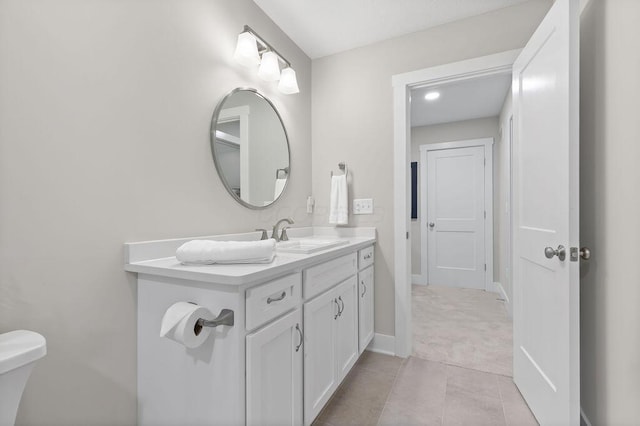 7276 Lee Rd, Westerville, OH 43081 - bathroom with vanity, toilet, baseboards, and tile patterned flooring