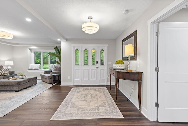 7276 Lee Rd, Westerville, OH 43081 - foyer entrance featuring dark wood finished floors, recessed lighting, and baseboards