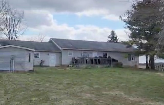 23454 Davis Rd, West Mansfield, OH 43358 - rear view of property featuring a wooden deck and a yard