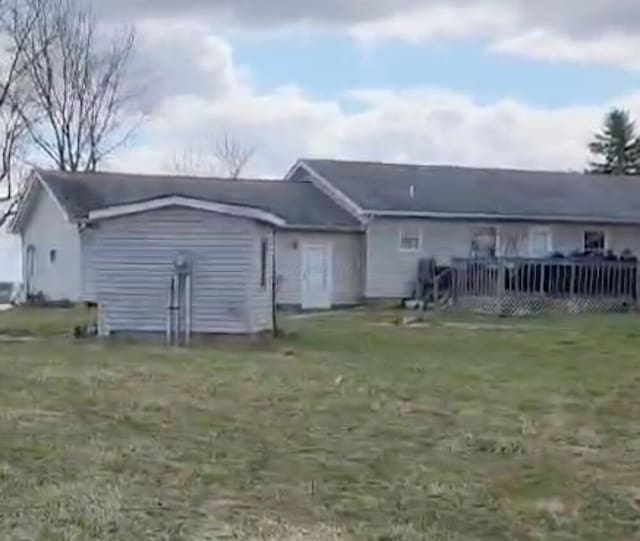23454 Davis Rd, West Mansfield, OH 43358 - rear view of house with a wooden deck and a yard