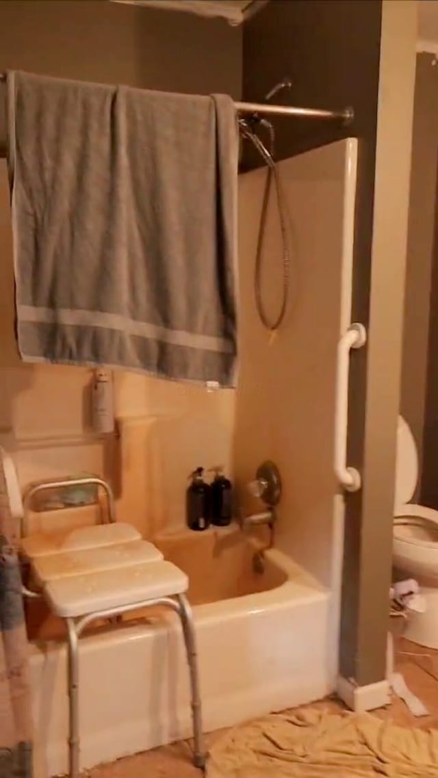 23454 Davis Rd, West Mansfield, OH 43358 - full bathroom featuring toilet and bathtub / shower combination