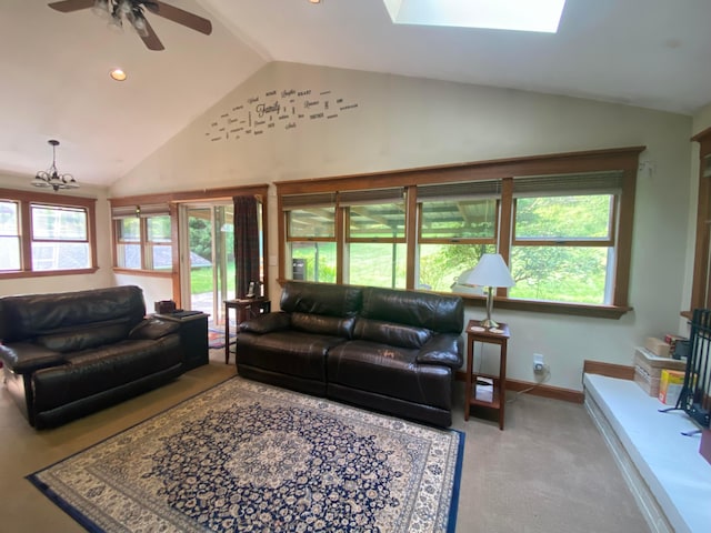 192 Bridle Path Ln, Granville, OH 43023 - living room with a ceiling fan, carpet, a skylight, high vaulted ceiling, and baseboards