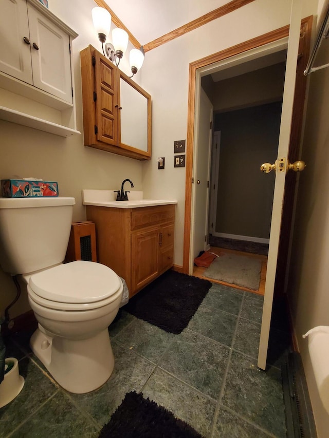 192 Bridle Path Ln, Granville, OH 43023 - half bathroom featuring vanity, toilet, and crown molding