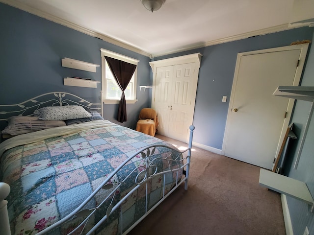 192 Bridle Path Ln, Granville, OH 43023 - carpeted bedroom with crown molding, a closet, and baseboards