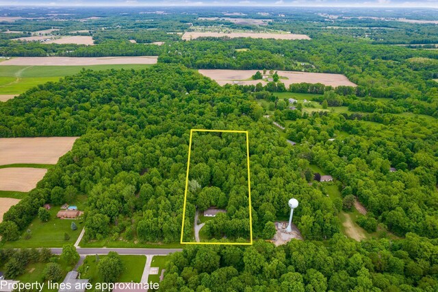 4015 County Road 25, Cardington, OH 43315 - aerial overview of property's location with property parcel outlined and a forest