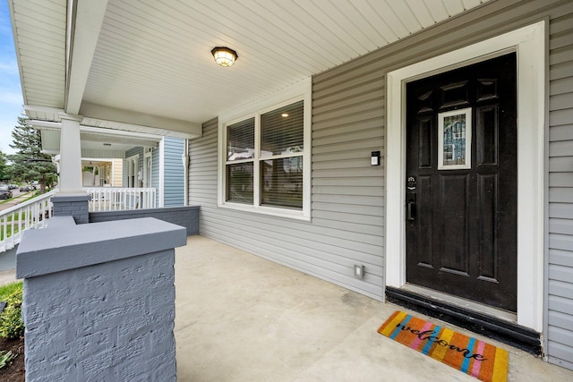 731 Siebert St, Columbus, OH 43206 - doorway to property featuring a porch