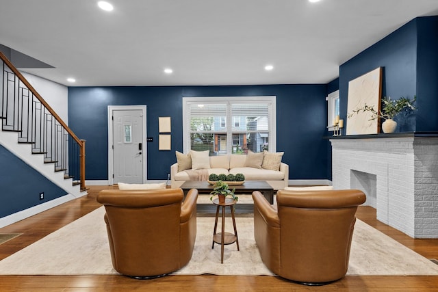 731 Siebert St, Columbus, OH 43206 - living area with stairs, wood finished floors, recessed lighting, and baseboards