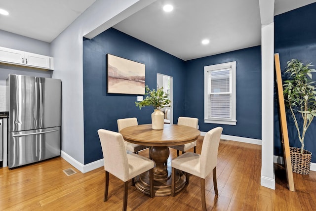 731 Siebert St, Columbus, OH 43206 - dining area with baseboards, light wood-type flooring, and recessed lighting
