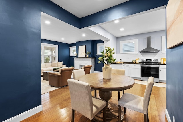 731 Siebert St, Columbus, OH 43206 - dining area with light wood-style flooring, recessed lighting, and baseboards