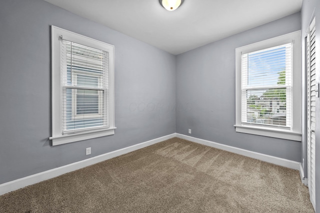 731 Siebert St, Columbus, OH 43206 - empty room featuring carpet and baseboards