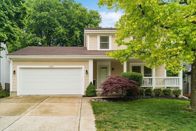 1693 Hale Ct, Columbus, OH 43228 - view of front of house with concrete driveway, a front lawn, a garage, covered porch, and roof with shingles