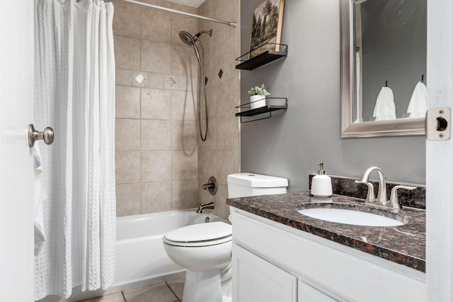 1693 Hale Ct, Columbus, OH 43228 - bathroom featuring shower / bath combo, vanity, toilet, and tile patterned flooring