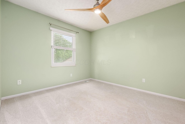 1693 Hale Ct, Columbus, OH 43228 - carpeted empty room with ceiling fan, a textured ceiling, and baseboards