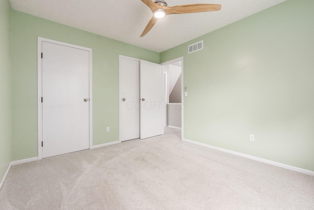 1693 Hale Ct, Columbus, OH 43228 - unfurnished bedroom with carpet, baseboards, and ceiling fan