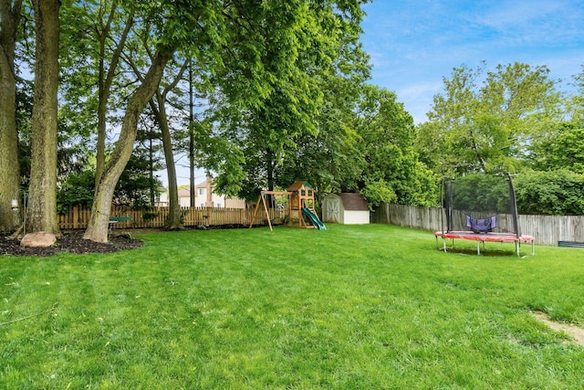 1693 Hale Ct, Columbus, OH 43228 - view of yard with a trampoline and a playground