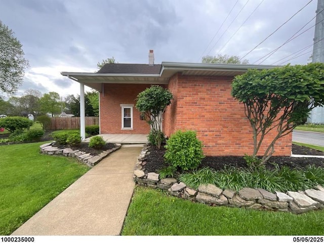 193 W Pearl St, West Jefferson, OH 43162 - view of front facade featuring brick siding