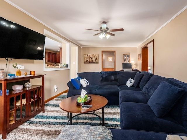 193 W Pearl St, West Jefferson, OH 43162 - living room with ceiling fan, baseboards, and ornamental molding