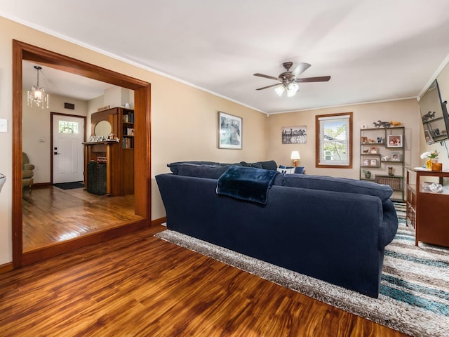 193 W Pearl St, West Jefferson, OH 43162 - living area with wood finished floors, ceiling fan, crown molding, and baseboards