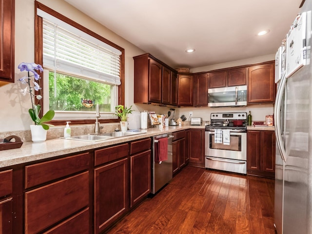 193 W Pearl St, West Jefferson, OH 43162 - kitchen with appliances with stainless steel finishes, a sink, dark wood-style floors, and recessed lighting