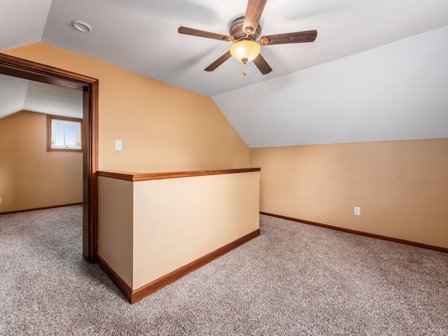 193 W Pearl St, West Jefferson, OH 43162 - additional living space featuring carpet, lofted ceiling, a ceiling fan, and baseboards
