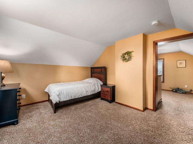 193 W Pearl St, West Jefferson, OH 43162 - bedroom featuring carpet floors, vaulted ceiling, and baseboards
