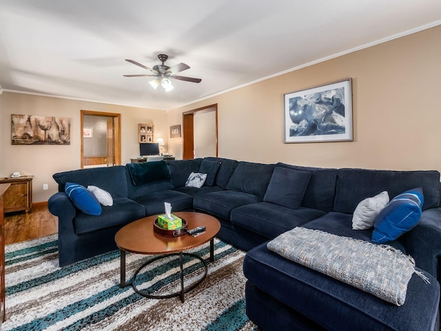 193 W Pearl St, West Jefferson, OH 43162 - living room featuring wood finished floors, ceiling fan, and crown molding